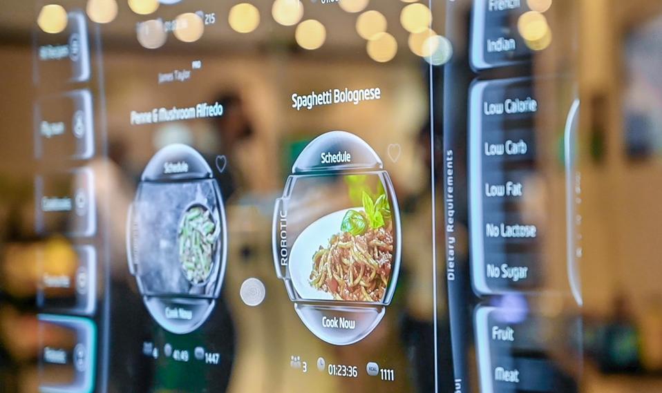 Digital screen with recipes for the robotic kitchen to cook.