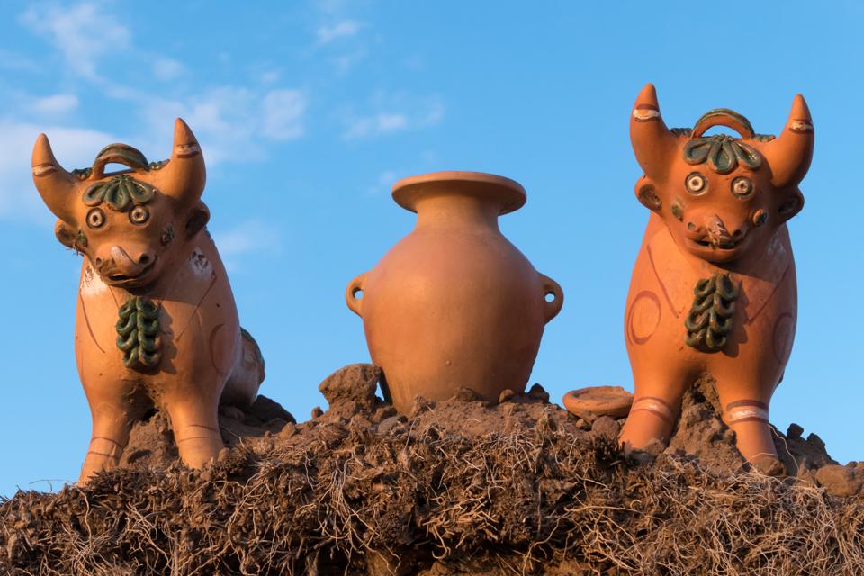 Close-up: Decorations on the roof of a farm near Puno, Peru