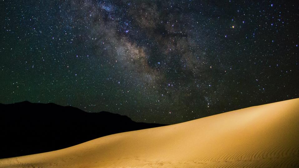 Milky Way over large sand dunes