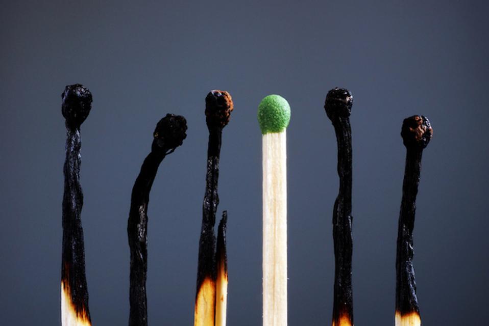 Line of burnt matches and one brand new. Video meeting fatigue is accelerating burnout