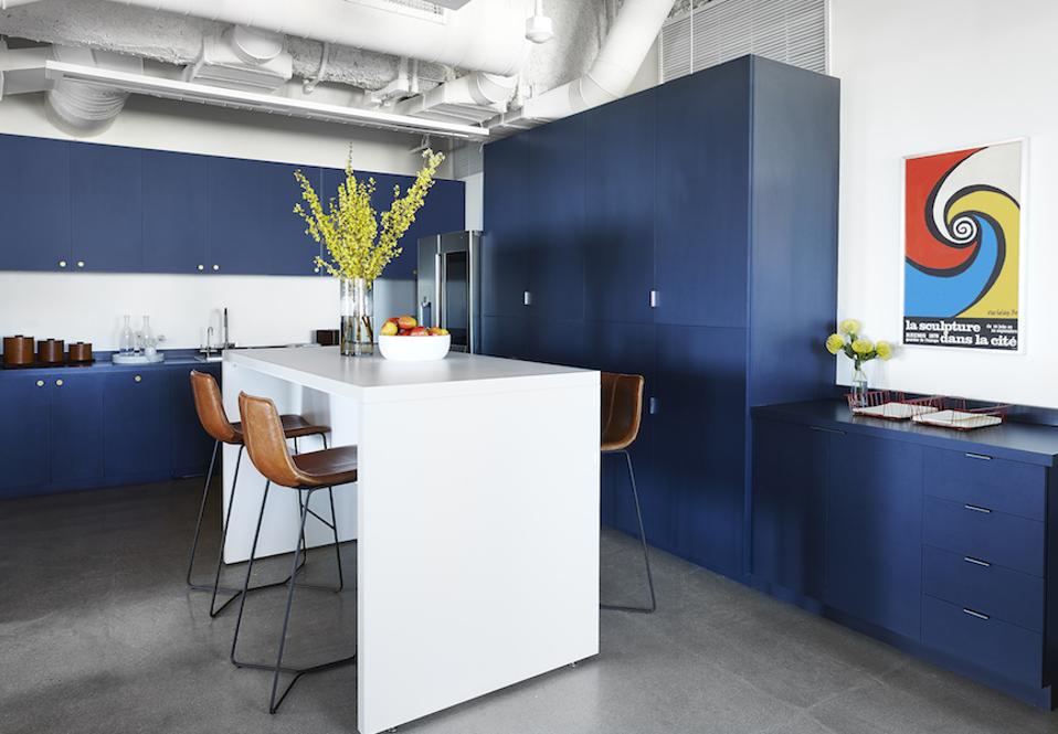 A blue and white office kitchen