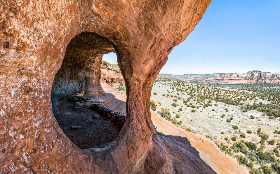 Robbers Roost Hideout in Moab, Utah, is a rock formation with a cave open on 2 sides