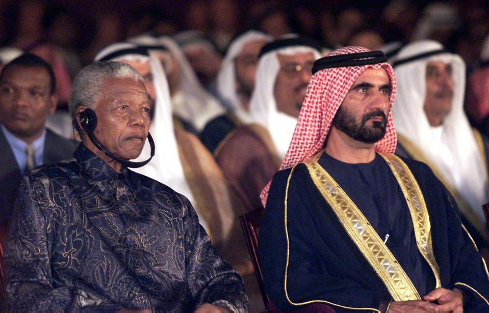 Former South Africa president Nelson Mandela (L) a