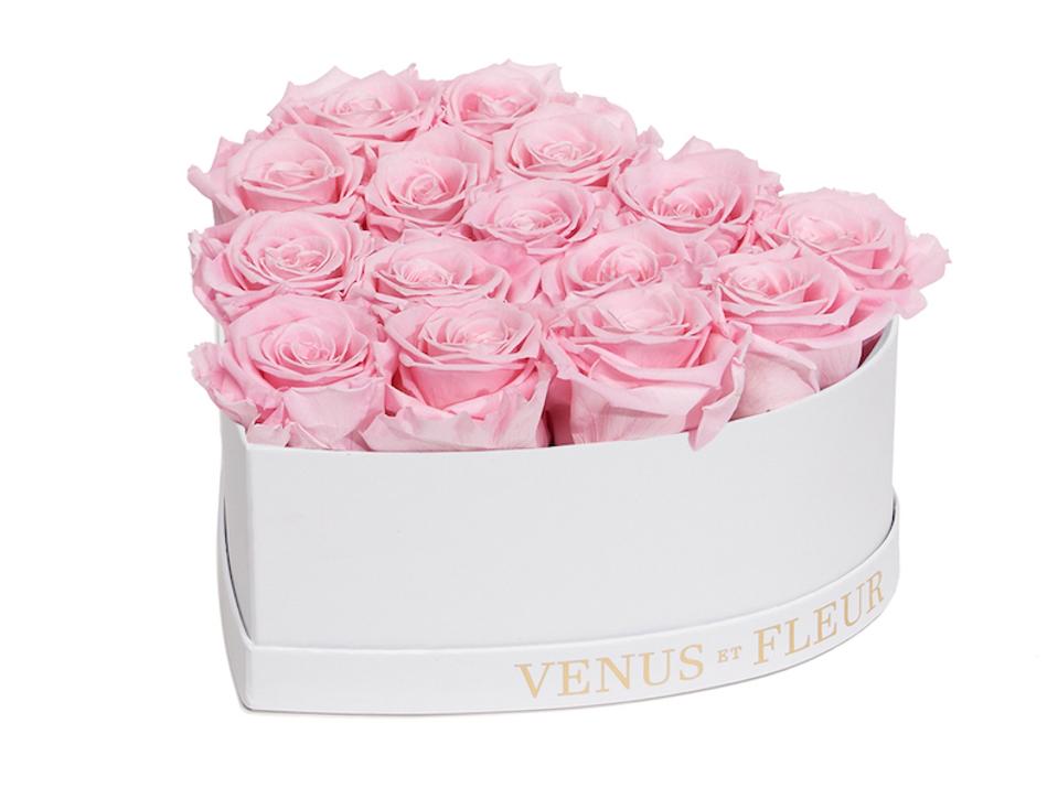 white heart shaped box of pink eternity roses