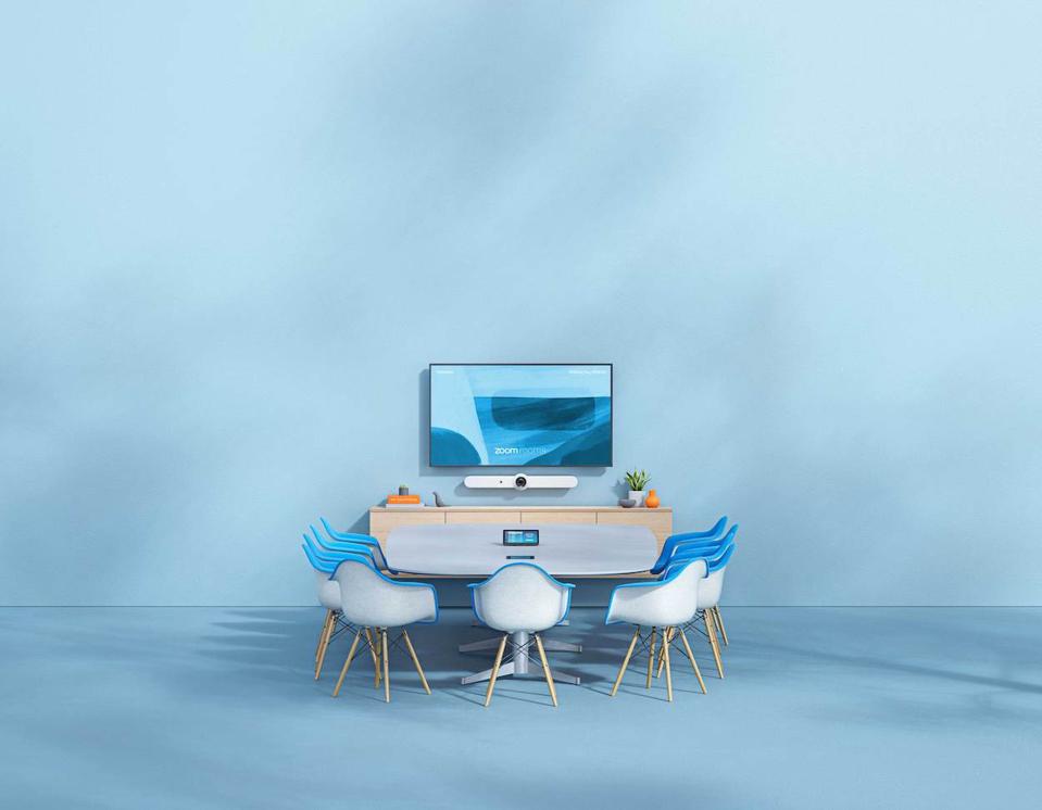 Table and large screen in a meeting room