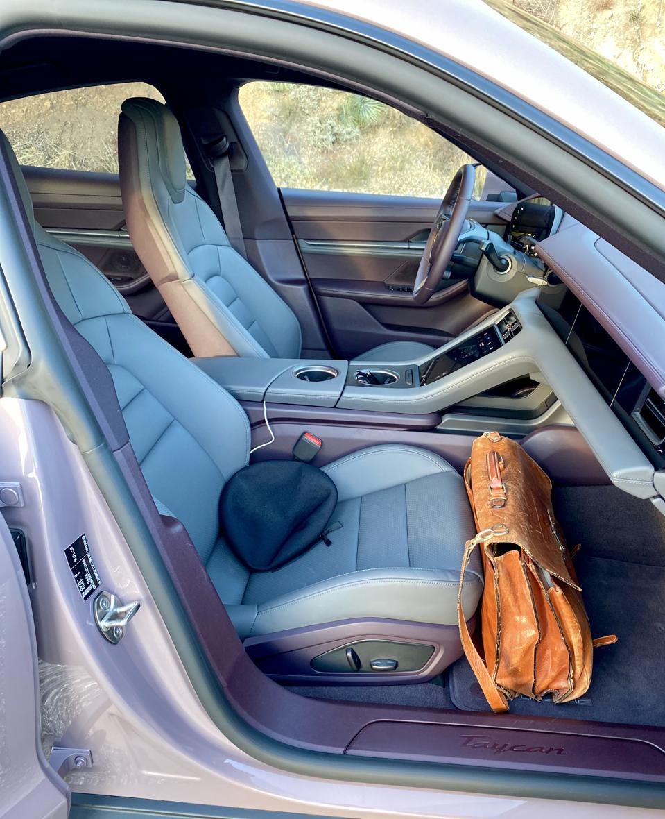 Taycan interior fits the norms of the German Sports Sedan genre.