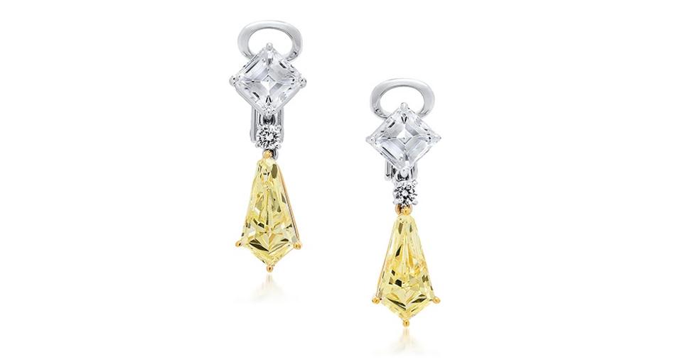These earrings feature kite-shaped yellow diamonds