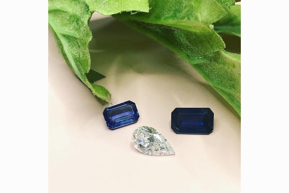 A gorgeous pear-shaped diamond and two sapphires