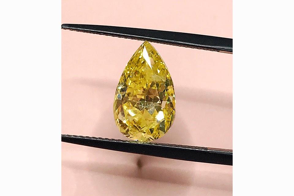 This pear-shaped fancy yellow diamond is destined for a gorgeous piece of jewelry