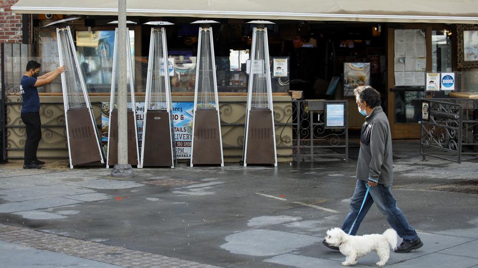 Los Angeles County reparations for resuming outdoor dining under loosened coronavirus restrictions, in Hermosa Beach, CA