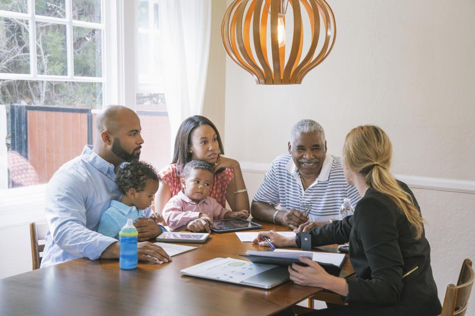 Financial advisor talking to clients