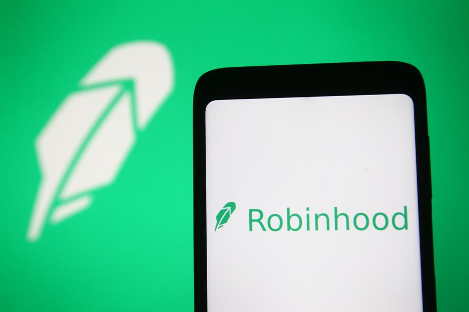 In this photo illustration a Robinhood logo of a U.S.