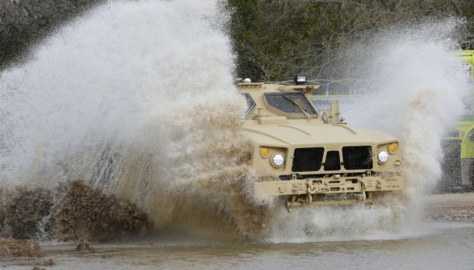 An M-ATV drives a course during a demonstration.