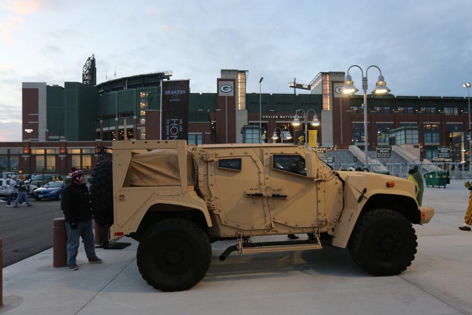 A JLTV at a Lions-Packers football game.