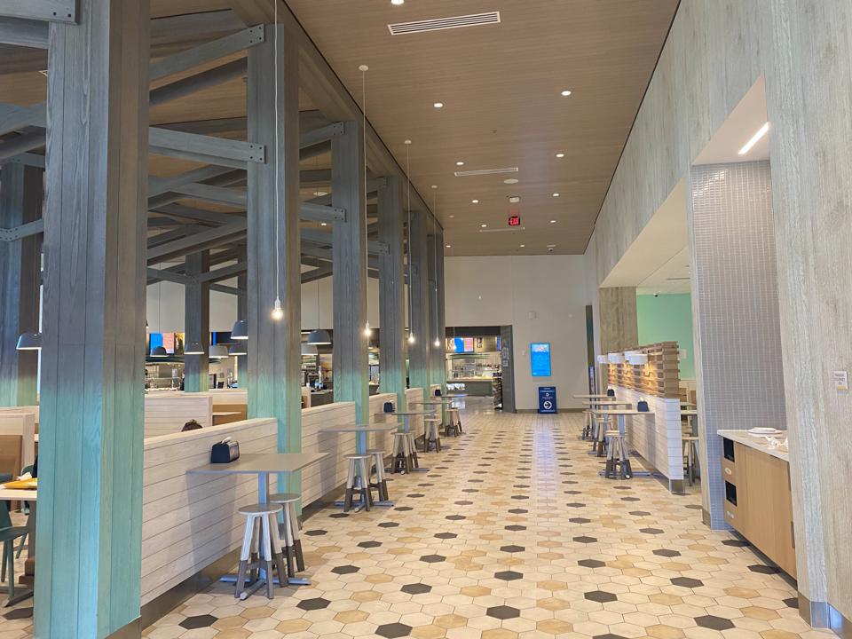 The decor in Endless Summer Dockside has echoes of the waterfront, like these pillars designed to evoke the feeling of being under a boardwalk