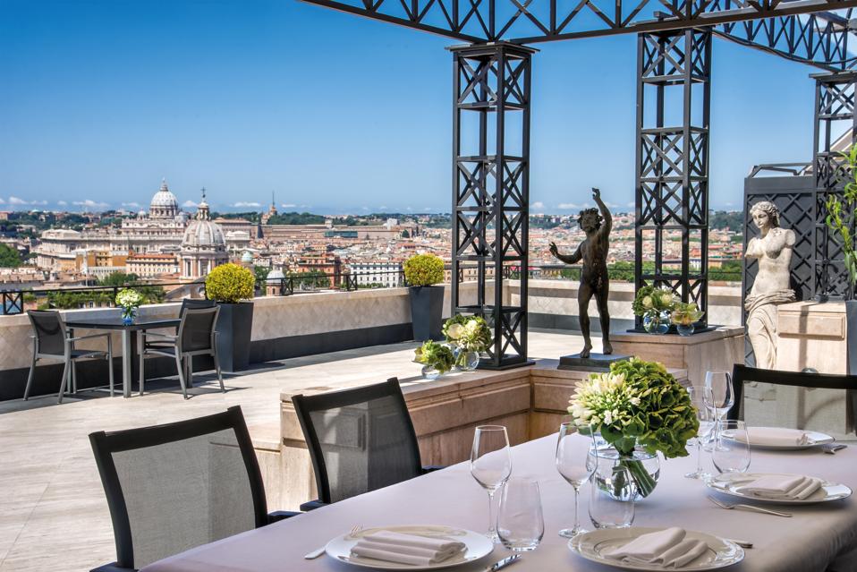 The terrace at the Hotel Hassler Roma overlooks the city of Rome, Italy