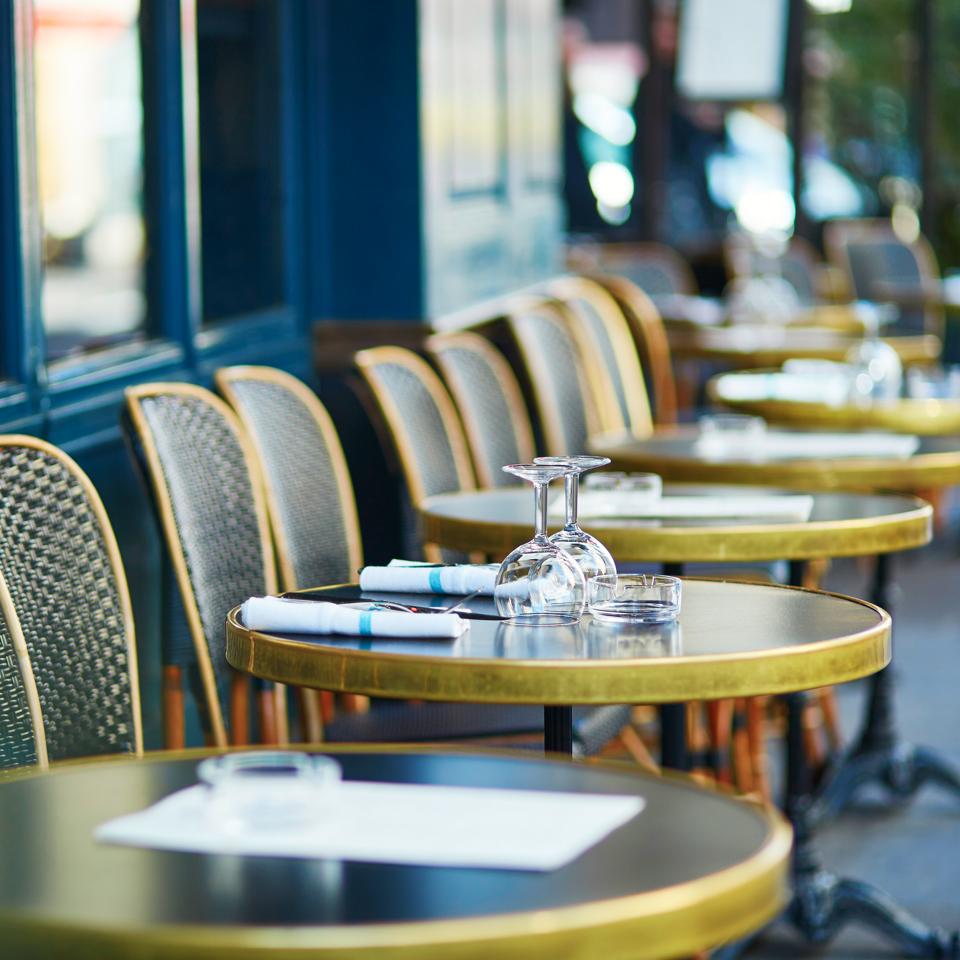 Glasses on a table of cozy Parisian outdoor cafe