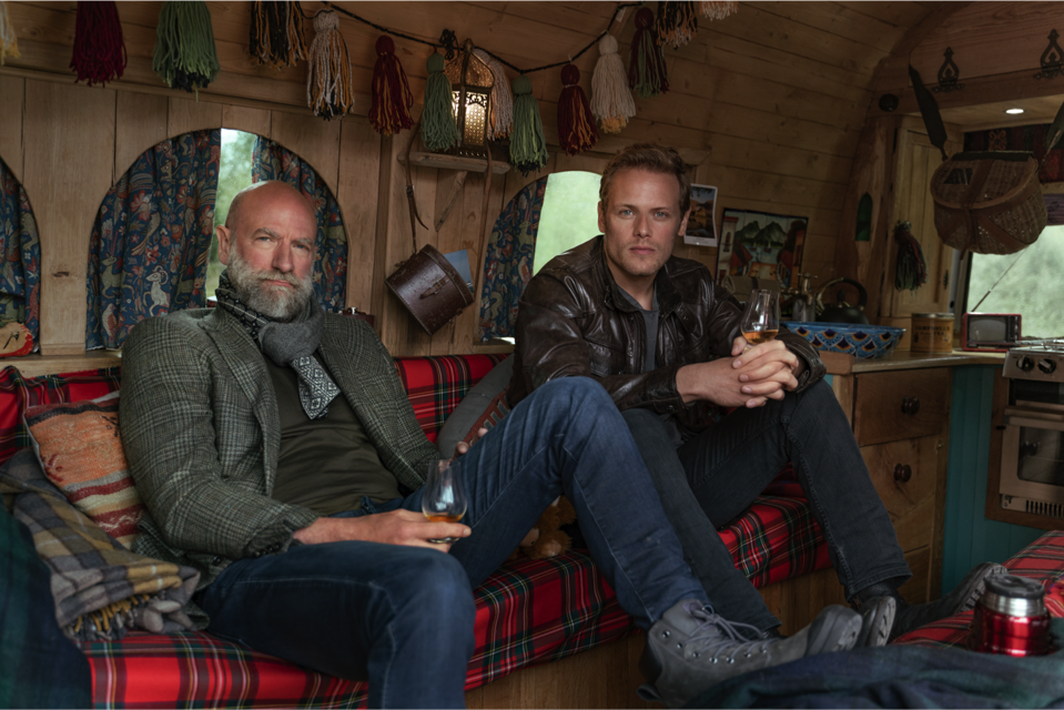 Outlander Stars Sam Heughan And Graham Mctavish Discuss Their New Men In Kilts Great Escape Series Outlander Stars Sam Heughan And Graham Mctavish Discuss Their New Men In Kilts Great Escape Series