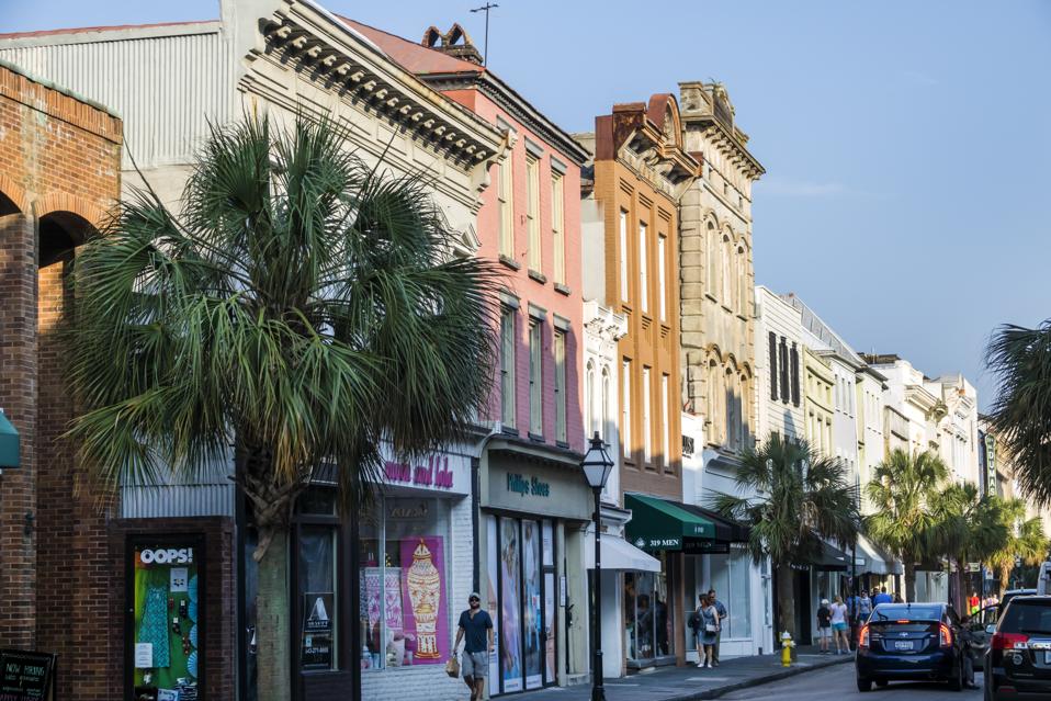 There are colorful buildings on the historic King Street in Charleson South Carolina