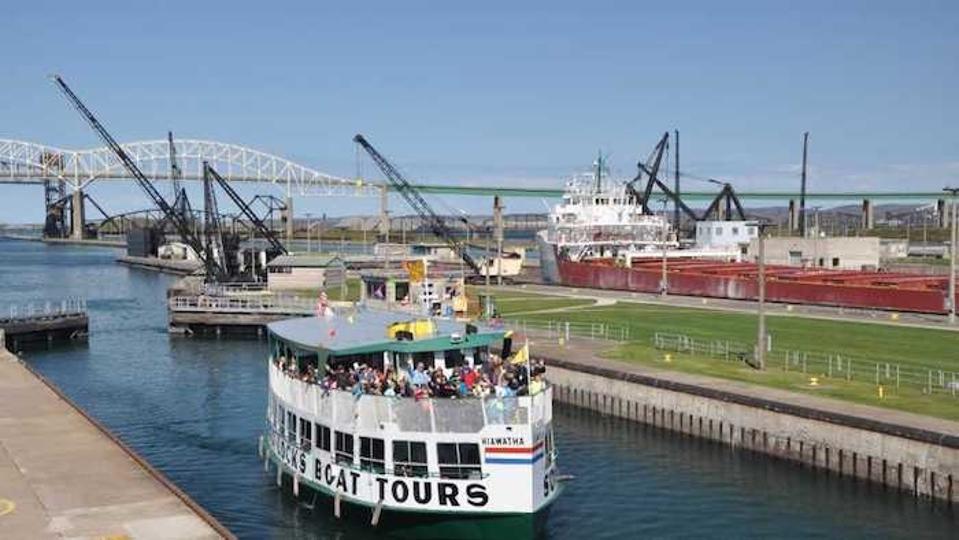 A Soo Locks Boat Tour with people in the Upper Peninsula.