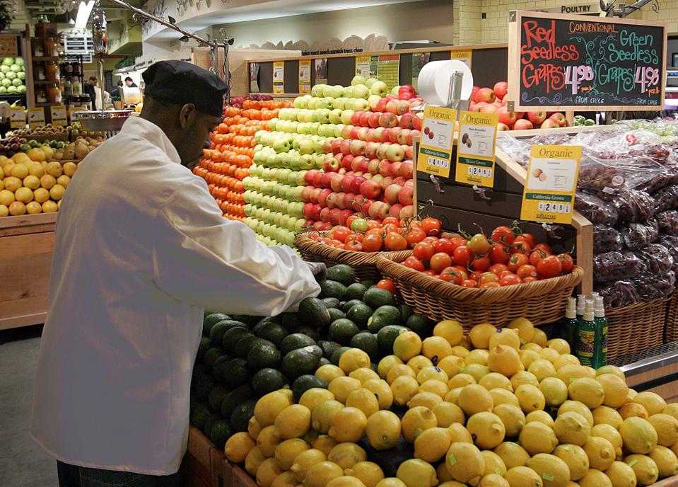 supermarket worker in produce department