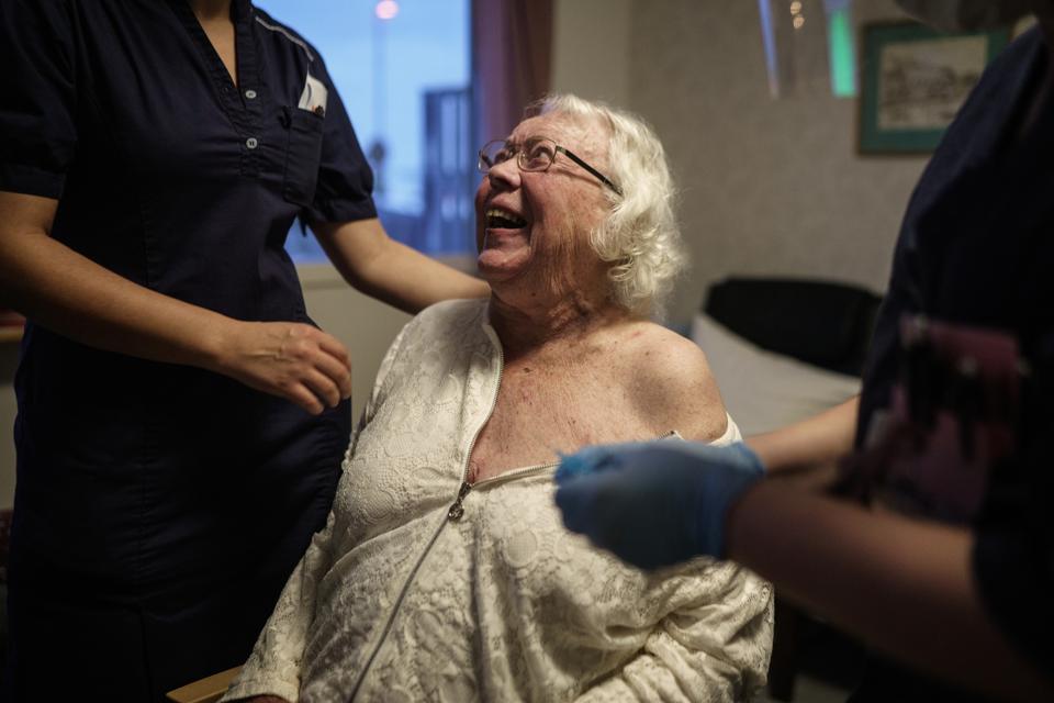 A resident at one of Gothenburg's nursing homes receives her first dose of the Pfizer-BioNtech Covid-19 vaccine on January 7, 2021 in Sweden.