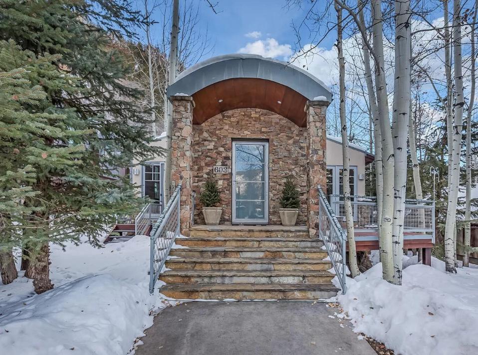 entrance to luxury aspen home at 603 s garmisch st colorado