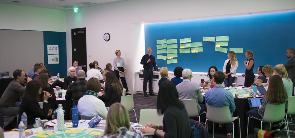 Participants at a SecondMuse workshop