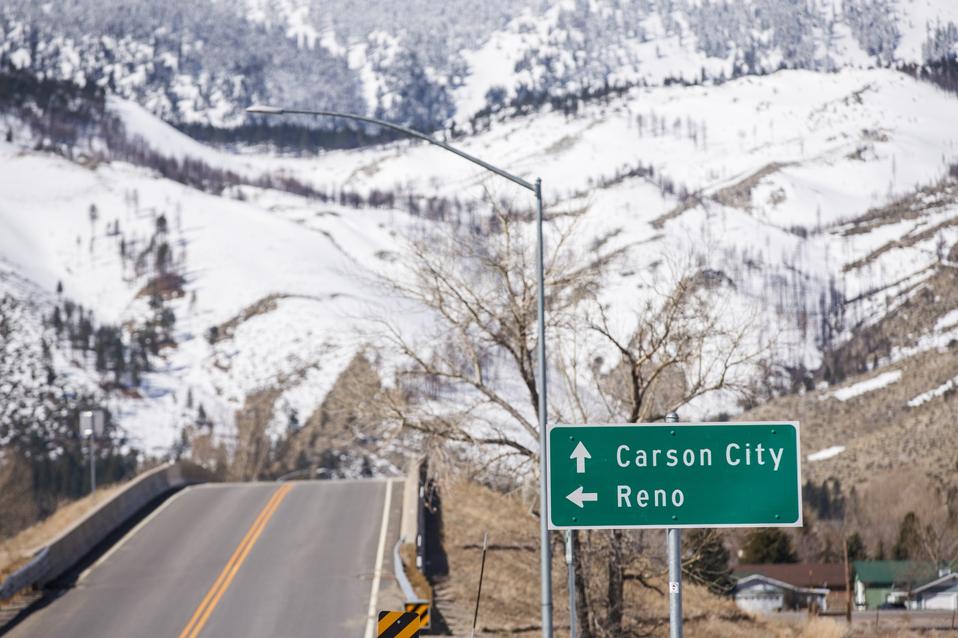 Street sign to Carson City and Nevada
