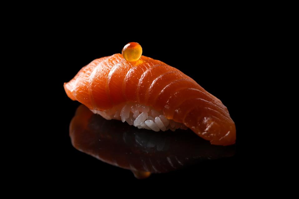 Close-Up Of Sushi Against Black Background