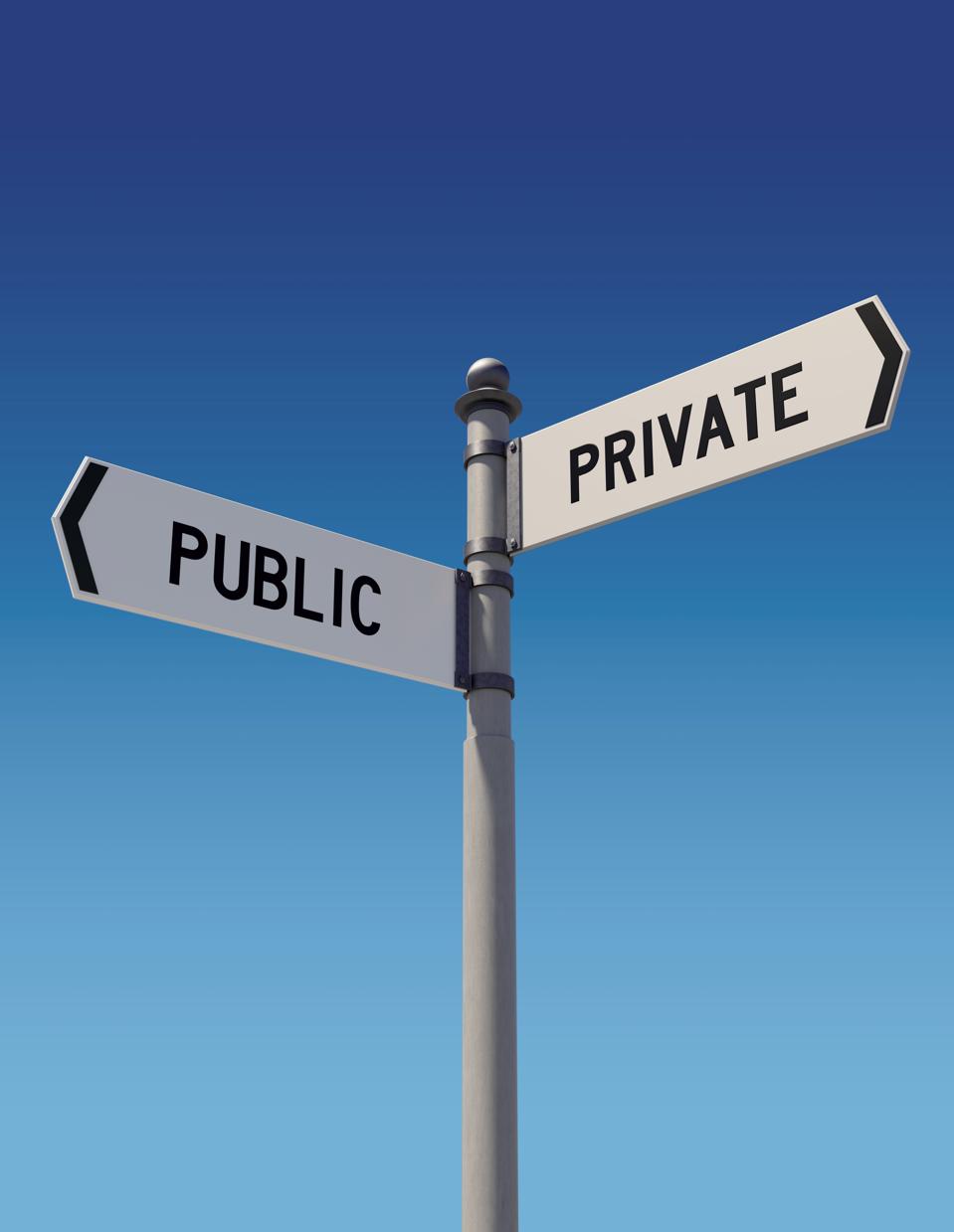 Street signs pointing opposite directions: Public or Private