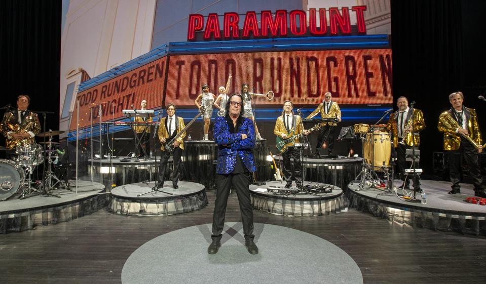 Todd Rundgren poses on stage with his 10-piece backing band during rehearsals for his ″Clearly Human″ virtual tour/livestream event. February 12, 2021 in Chicago, IL (Photo by Barry Brecheisen)