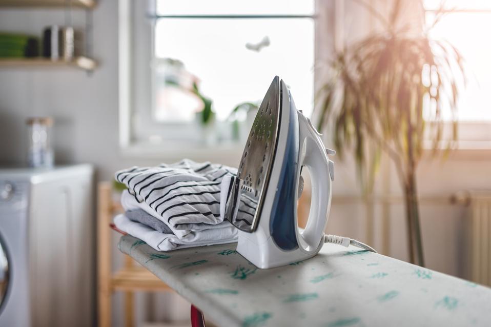 Ironing in the laundry room