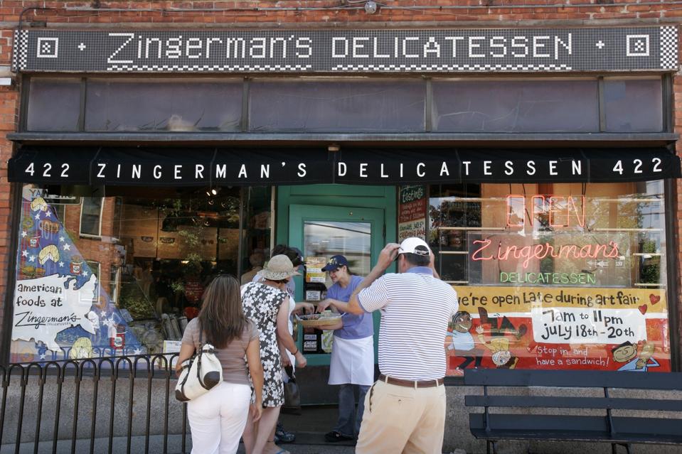 Customers dining outside Zingerman's Delicatessen.