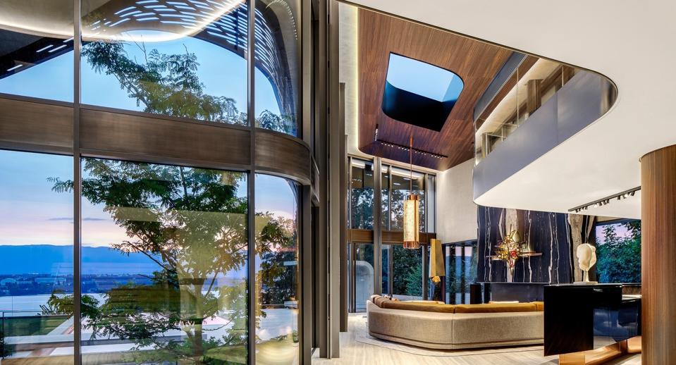 living room inside villa courbe saota-designed modern home switzerland cologny