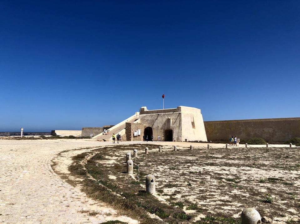 Fortaleza de Sagres in southwest Portugal stands beneath a bright blue sky
