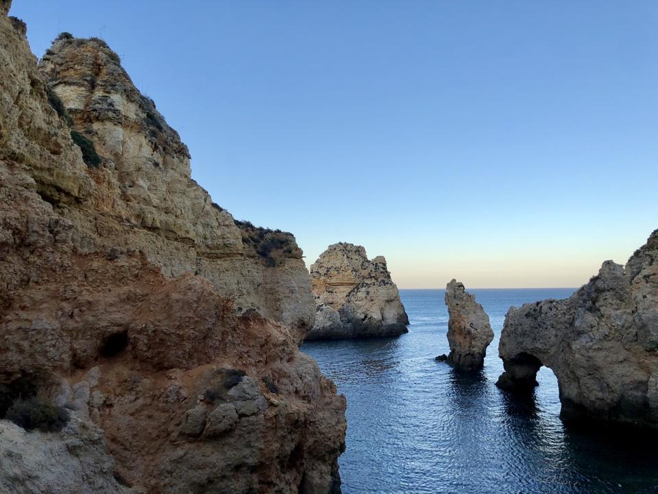 The rock formations of Ponta da Piedade in the Algarve, Portugal, rise up from the sea