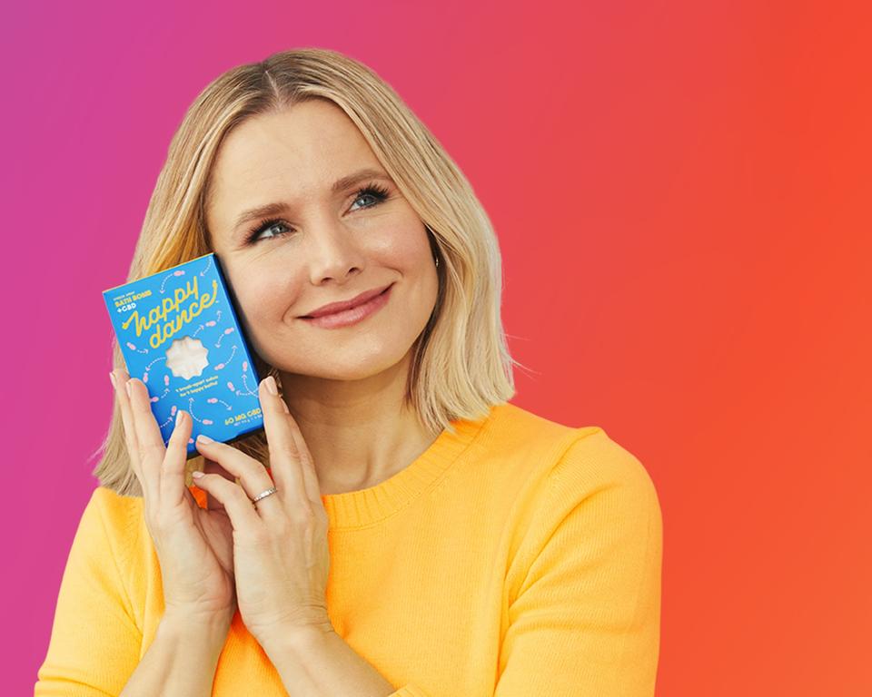 Kristen Bell hugs Happy Dance bath bomb