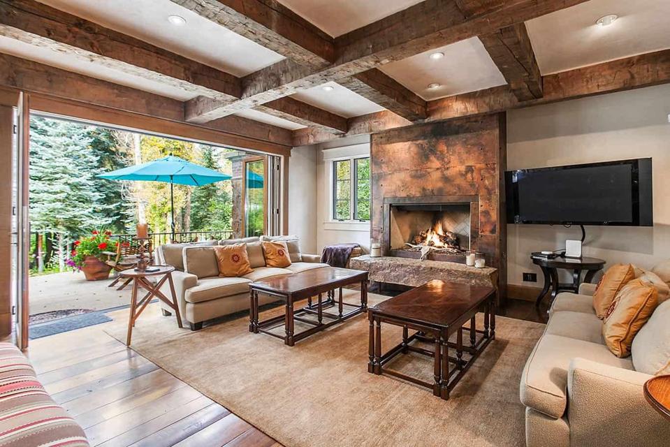 family room inside edwards colorado luxury home at 50 spruce lane