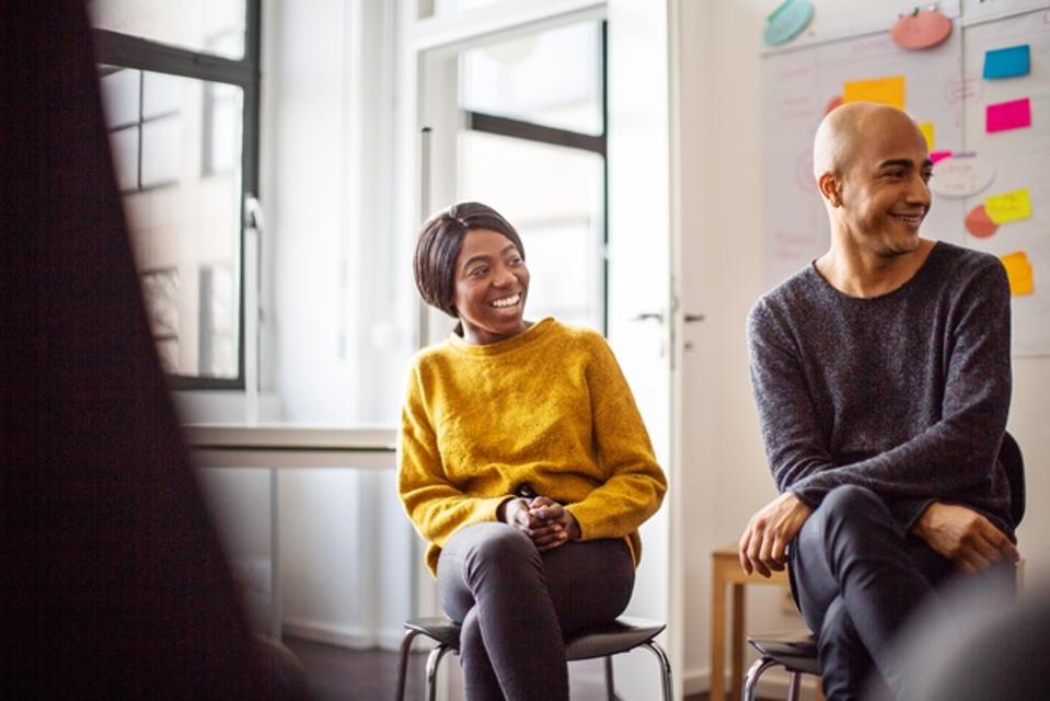 Smiling business people at a meeting