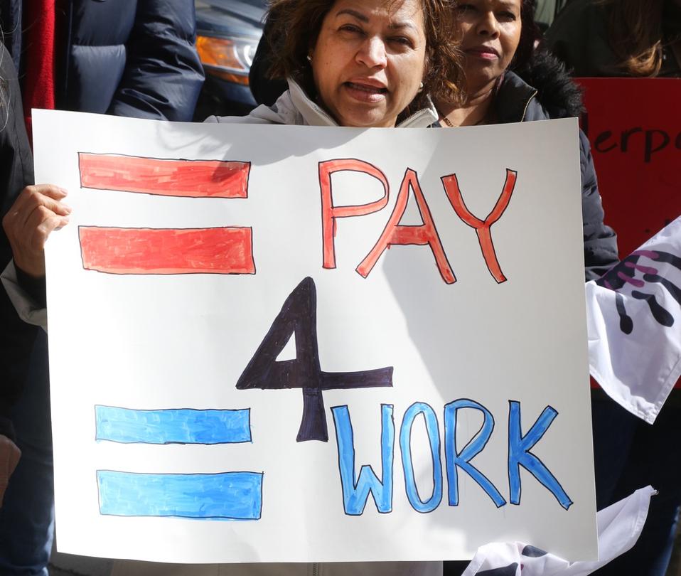 Women Rally On 'Equal Pay Day' In Toronto