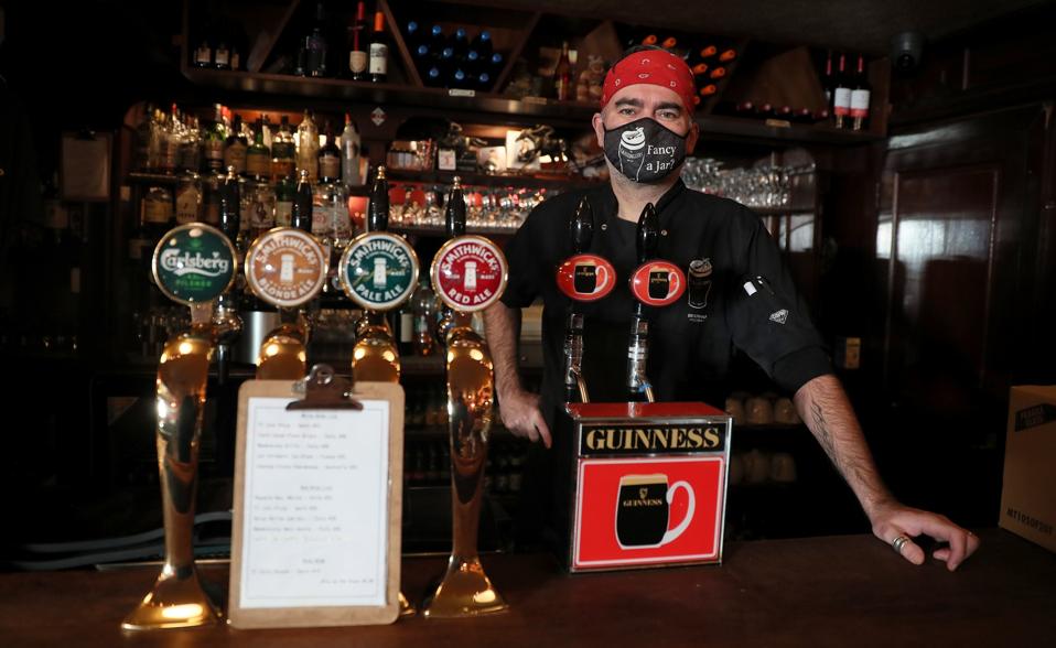 Ciaran Kavanagh stands behind John Kavanagh's bar, locally known as The Gravediggers, in Dublin, Ireland. (Photo by Brian Lawless/PA Images via Getty Images)