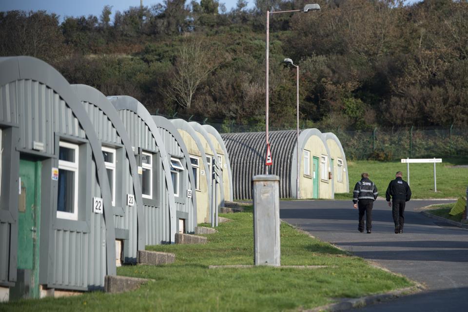 Britain Refuses To Stop Housing Asylum Seekers At Military Barracks