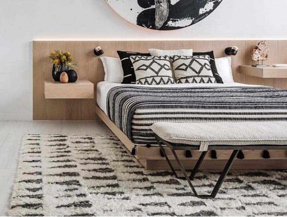 A bed and area rug