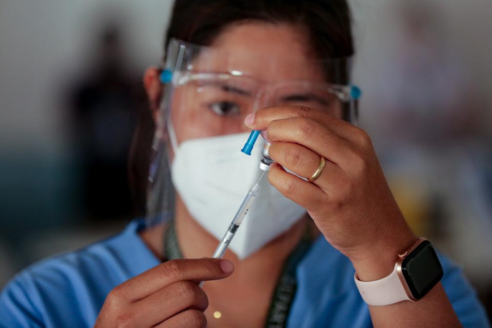 Filipino Health Care Workers Get Inoculated With Sinovac COVID19 Vaccine In Marikina, Philippines