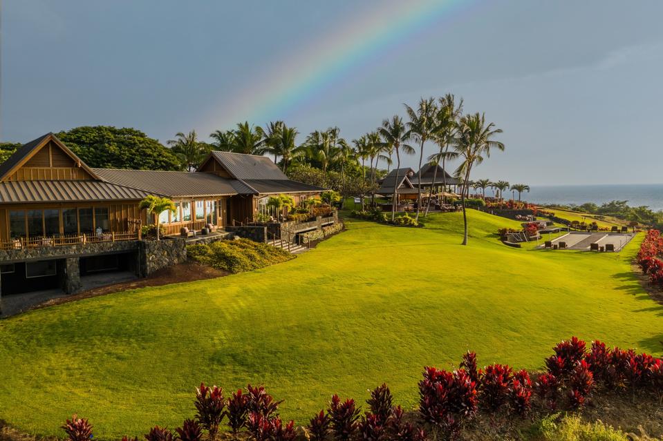 rainbow over clubhouse at hokulia residential club enlave hawaii big island kona kailua