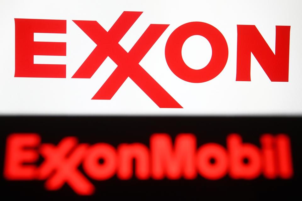 In this photo illustration, Exxon Mobile logo is seen...