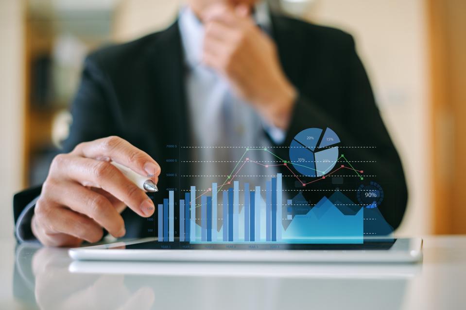 Businessman investor analyzing financial data