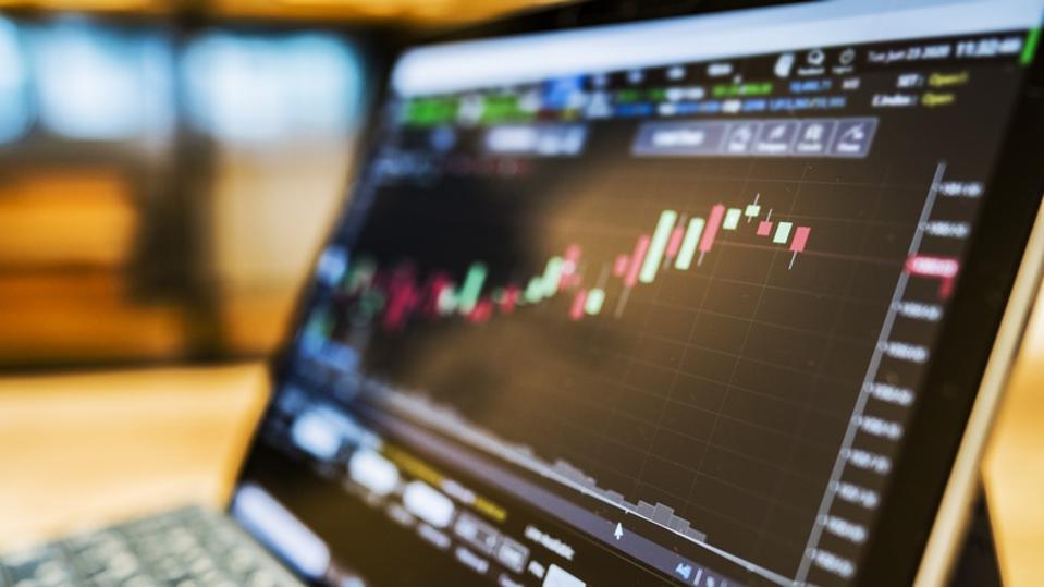 Stock market data on laptop