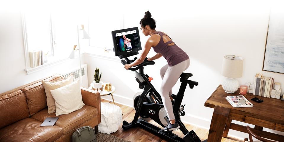 woman on exercise bike